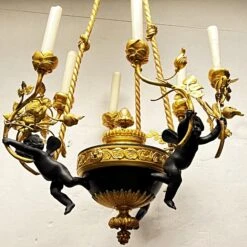 French Louis XVI Style Patinated Bronze Six-Light Putti Motif Chandelier -Promos Meubles Boutique ha 3263h master