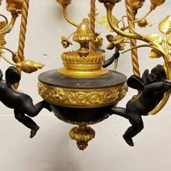 French Louis XVI Style Patinated Bronze Six-Light Putti Motif Chandelier -Promos Meubles Boutique ha 3263k master